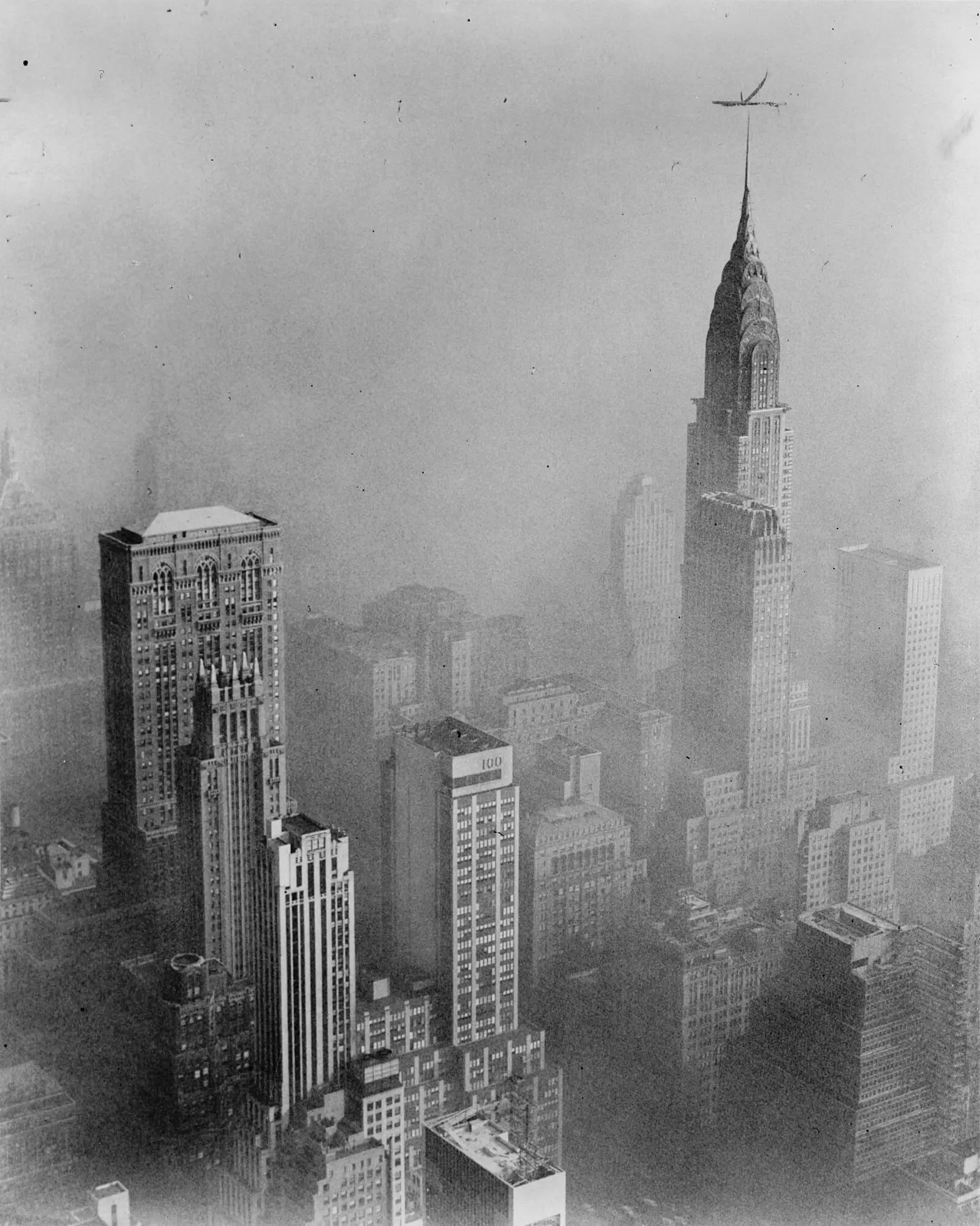 Smog obscures view of Chrysler Building from Empire State Building, New York City in the 1950’s