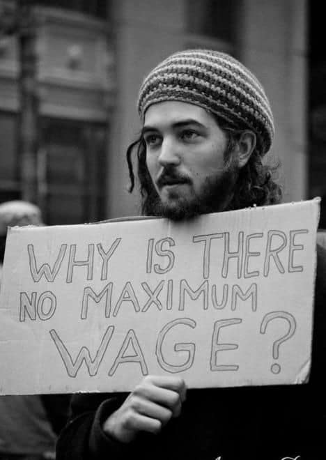 Protest sign: why is there no maximum wage?