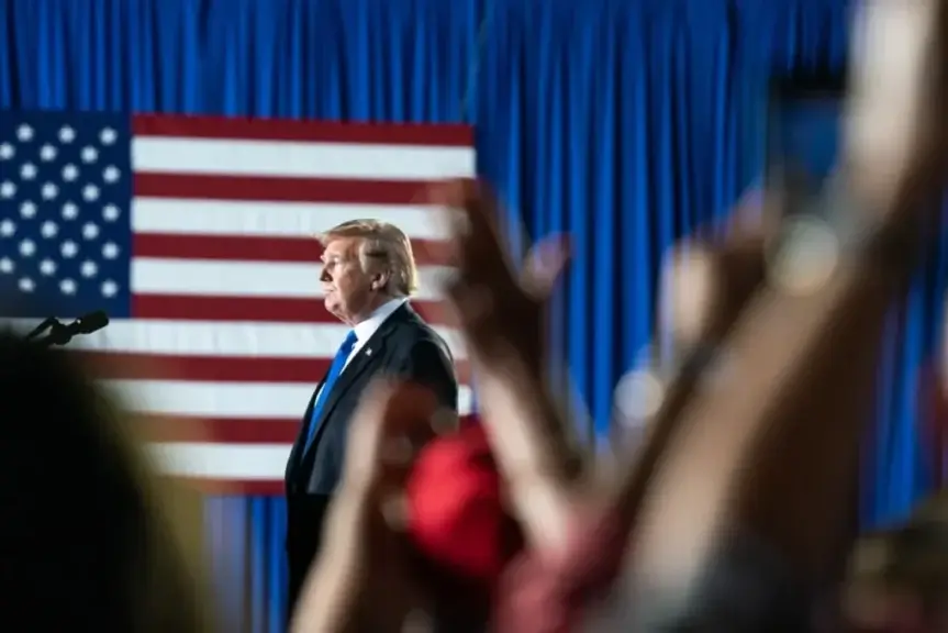 Donald trump with american flags in the background