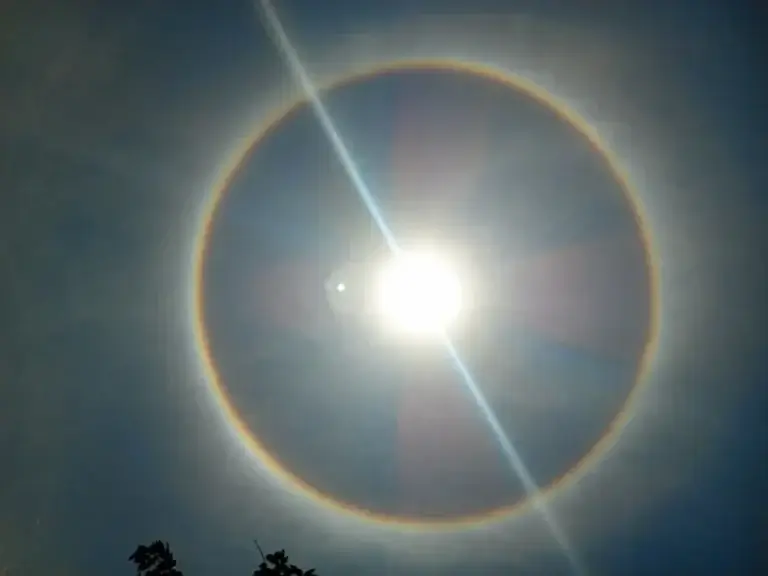 A photo of the sun with the rainbow ring around indicating heat