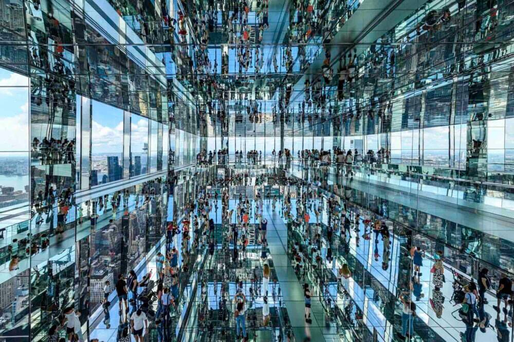 Photography contest people inside mirrored building 