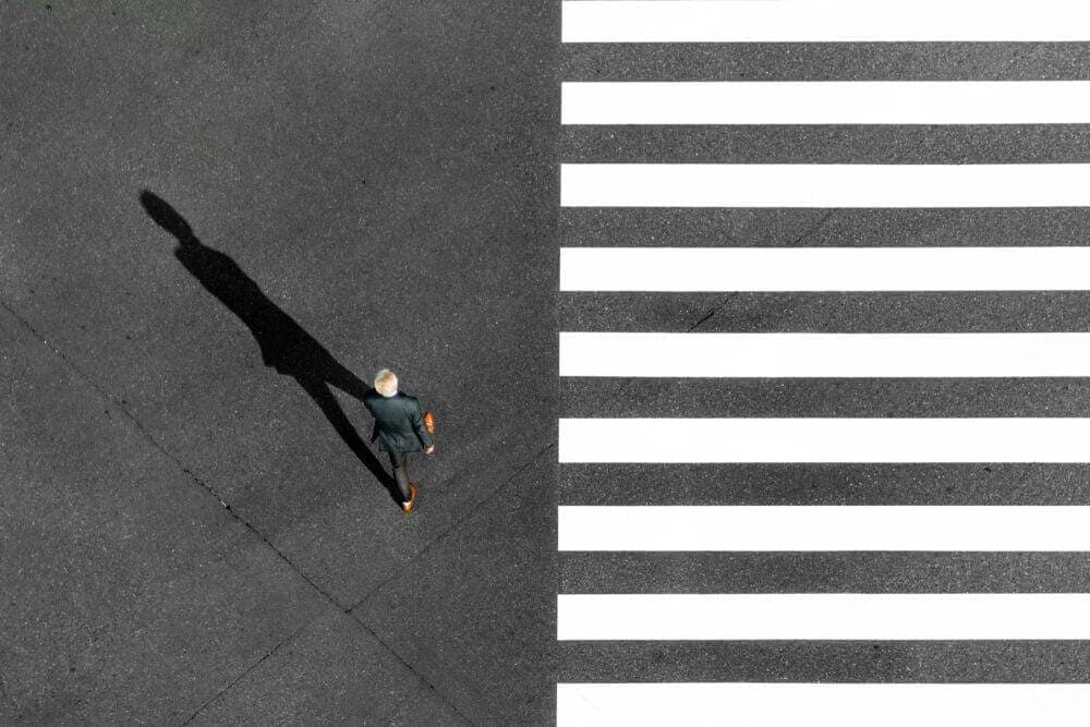 Photography contest man in crosswalk aerial view 