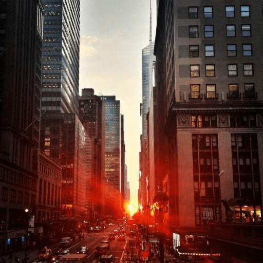 City view with sun shining between buildings 