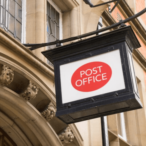 Post office sign on a city building 