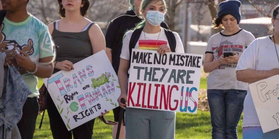 Lgbtq+ youth crisis a trans rights protest outside the kansas statehouse