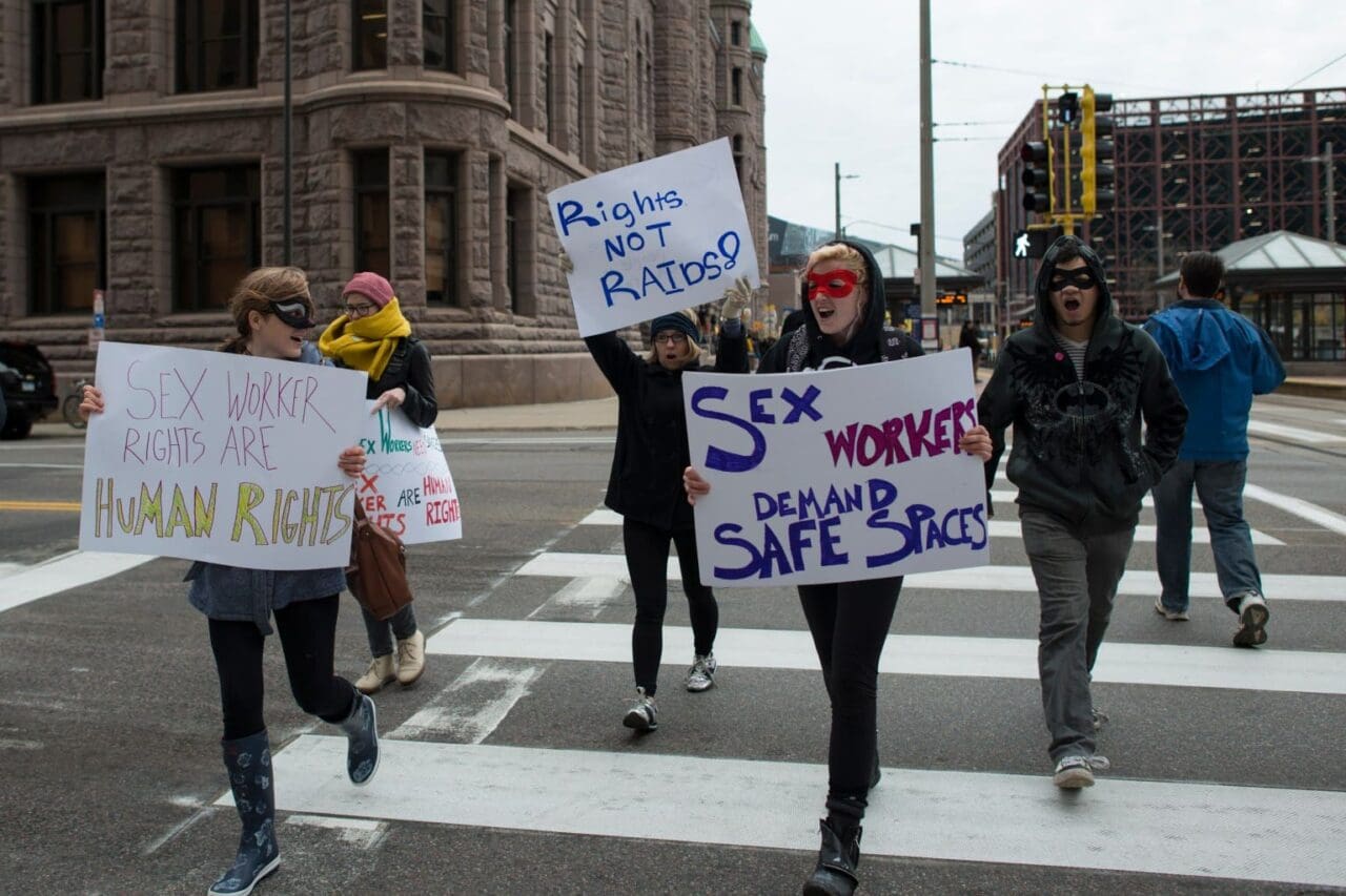 Sex workers and their supporters protest a police raid on Oct. 25, 2016, in Minneapolis saying shutting down sites like Backpage.com exposes them to more risk