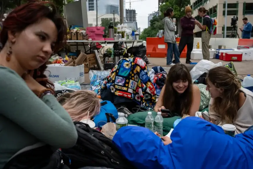 From left, university of texas at austin students ana maria, piper leleux, daniella alfonso and eliza sommers camp outside of the travis county jail on tuesday, april 30, 2024, as they await the release of pro-palestinian protesters who were arrested monday from an encampment on the ut-austin campus
