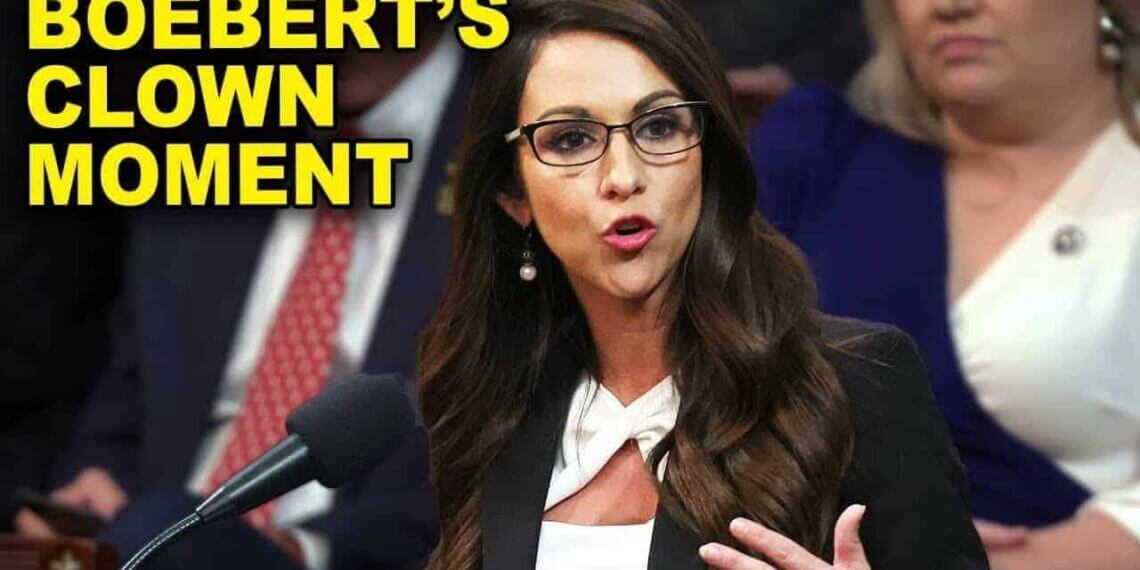 Lauren boebert speaking at a mic