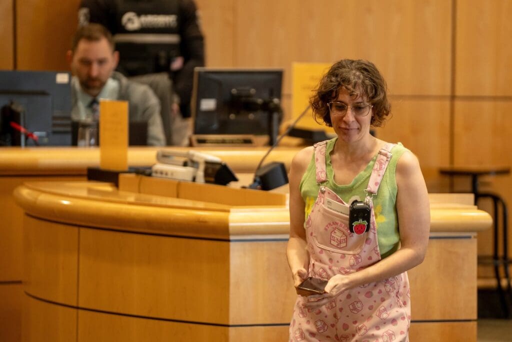 Shasta county California resident Jenny O'Connell returned to her seat after public comment in Redding on April 2, 2024. She thanked Joanna Francescut for handling the March presidential primary election process.