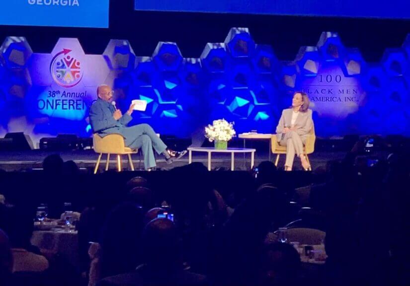 Vice president kamala harris is interviewed by comedian steve harvey at 100 black men event in atlanta june 14, 2024.