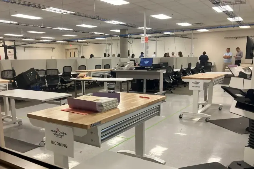 Workers test ballot tabulators inside maricopa county's tabulation center prior to the march 2024 presidential preference election. A temporary elections worker was arrested on june 21, 2024 after allegedly stealing keys to the county's ballot tabulators.