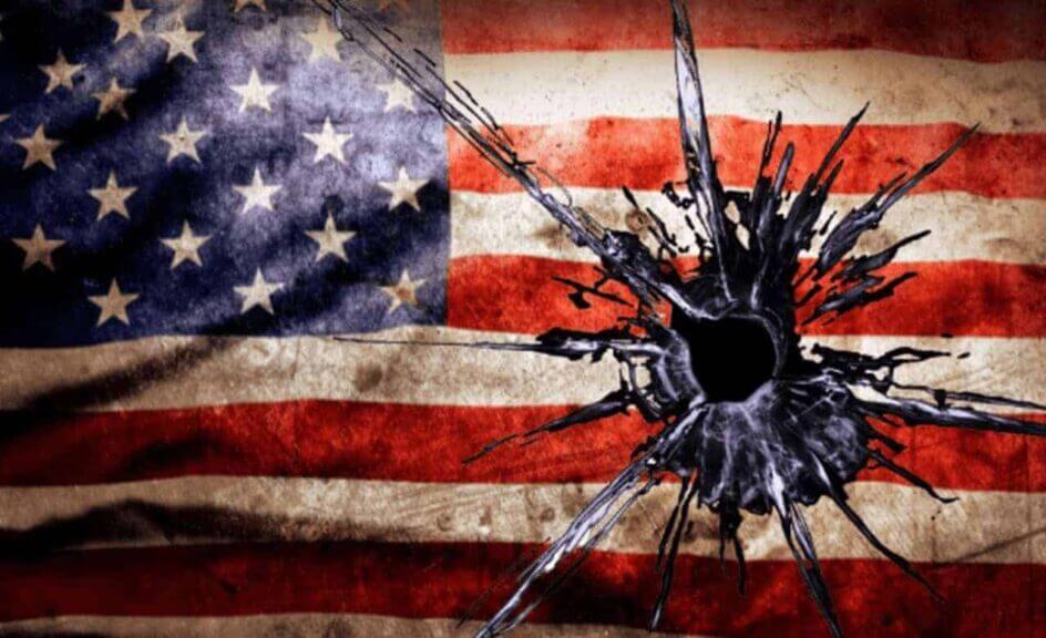 Image of the american flag with a bullet hole in it