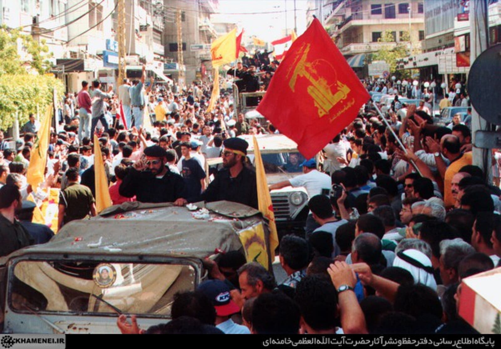 Hezbollah members and supporters at a parade following the end of Israel's occupation of southern Lebanon.