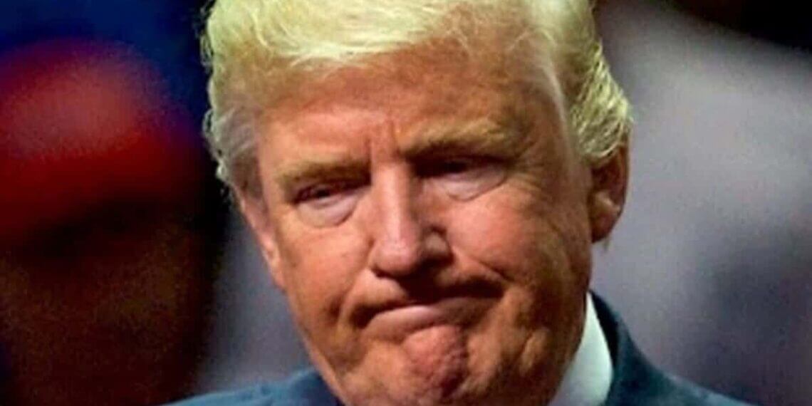 Donald trump with a regretful expression on his face