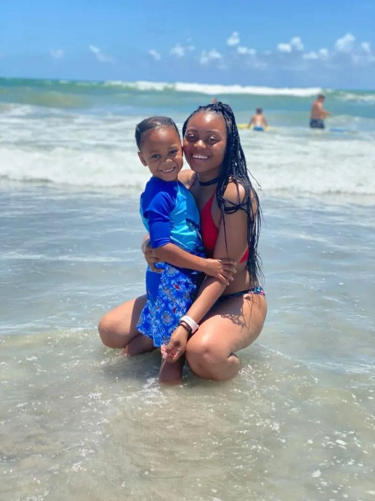 Biden executive order. Amber Thurman and her son at the beach.