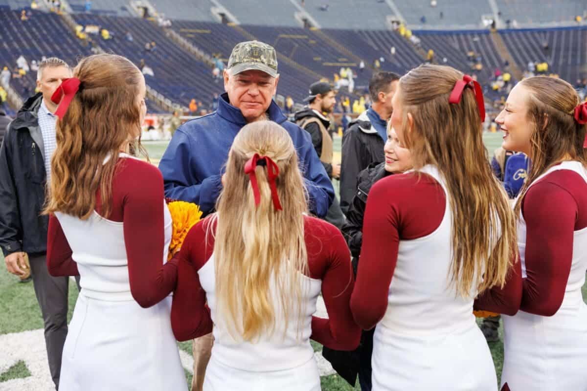 Minnesota gov. Tim walz visits the field of michigan stadium in ann arbor, mich. , on sept. 28, 2024. Walz attended the university of michigan vs university of minnesota football game. (photo by andrew roth/michigan advance)