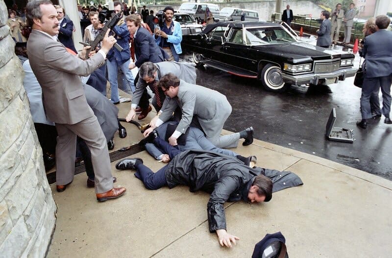 Photograph of chaos outside the Washington Hilton Hotel after the assassination attempt on President Reagan