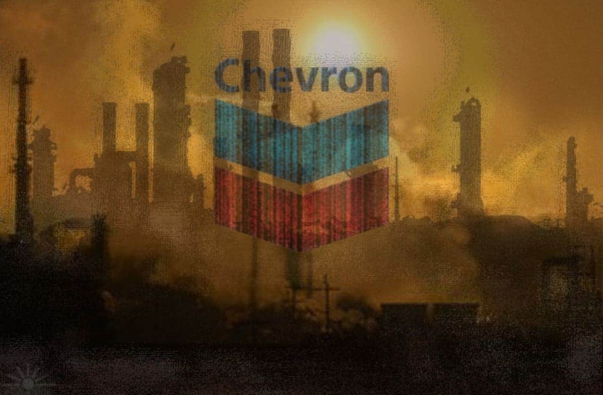 Chevron logo on a background of dirty air pollution