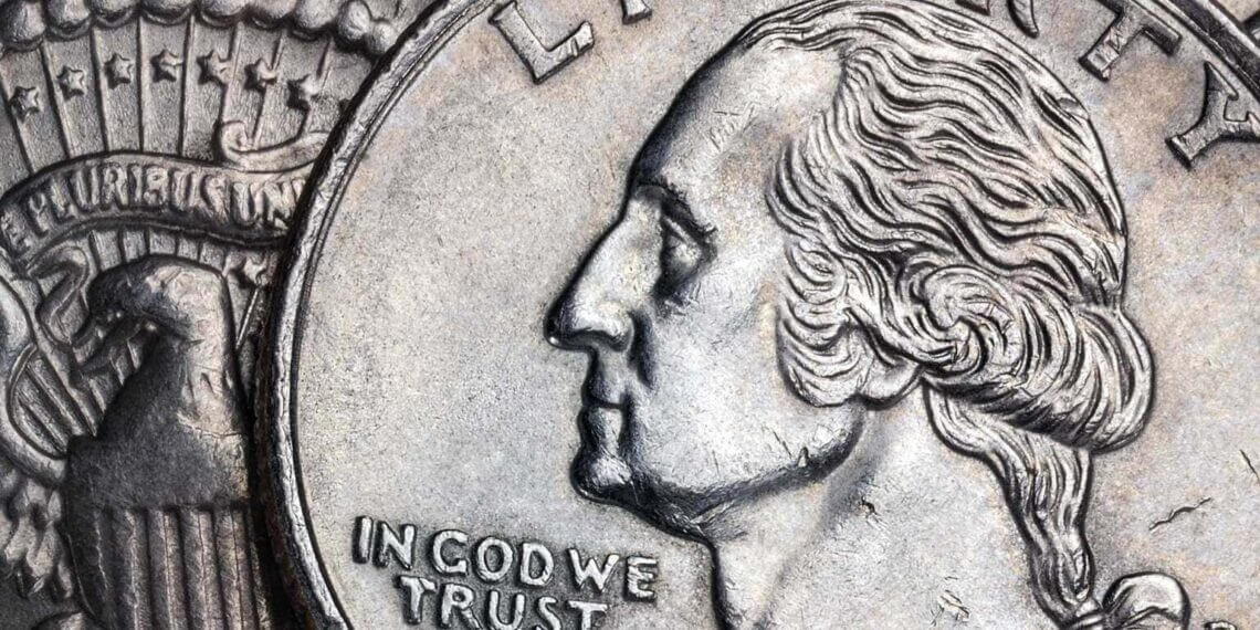 Close up of an american coin with the words in god we trust on it.
