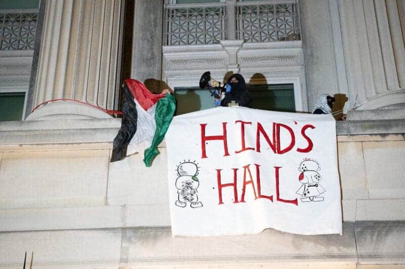 Columbia university student takeover of building draped banner outside