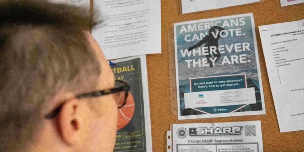 A voting pamphlet on a board at the u. S. Army's camp kosciuszko, poland