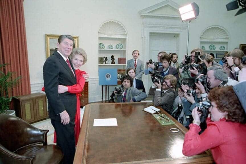 Republican win: nancy reagan hugs president reagan as he makes an address to the nation announcing the reagan-bush candidacies for re-election