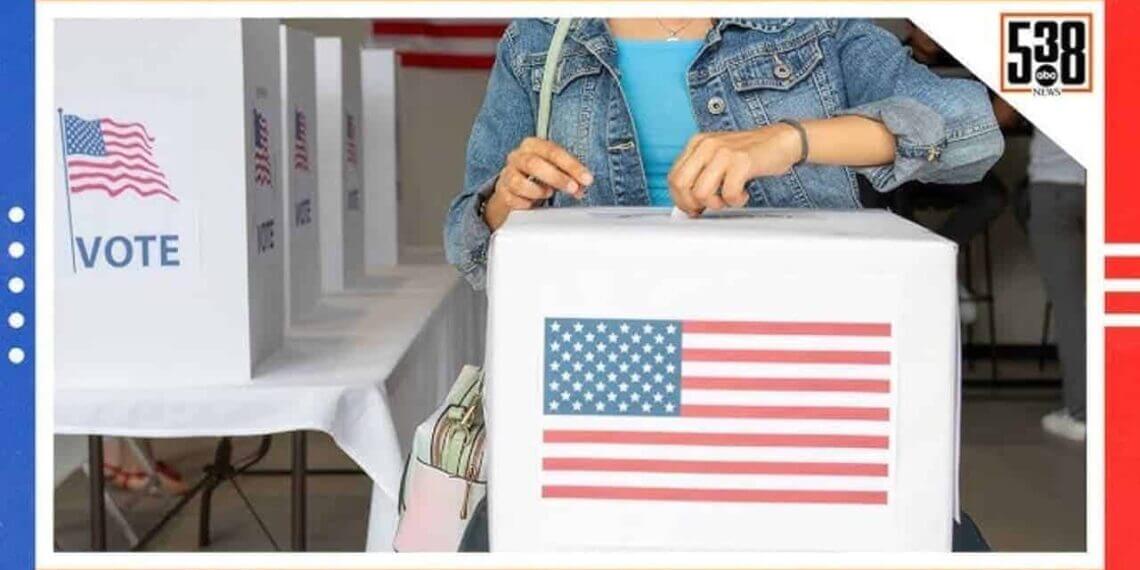 A woman putting a ballot in a ballot box with an american flag on the front