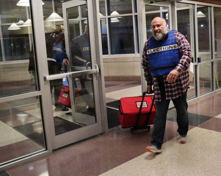 Democracy needs to be protected. Election security official mark schondelmaier brings ballots into the lyon county courthouse to be counted on election night.