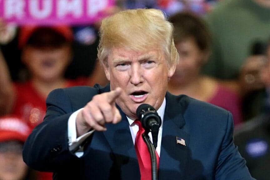 President-elect trump, at the time a candidate  at a rally pointing at the camera