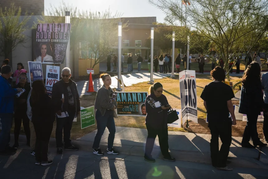 Texas voters waiting in line at a polling location.