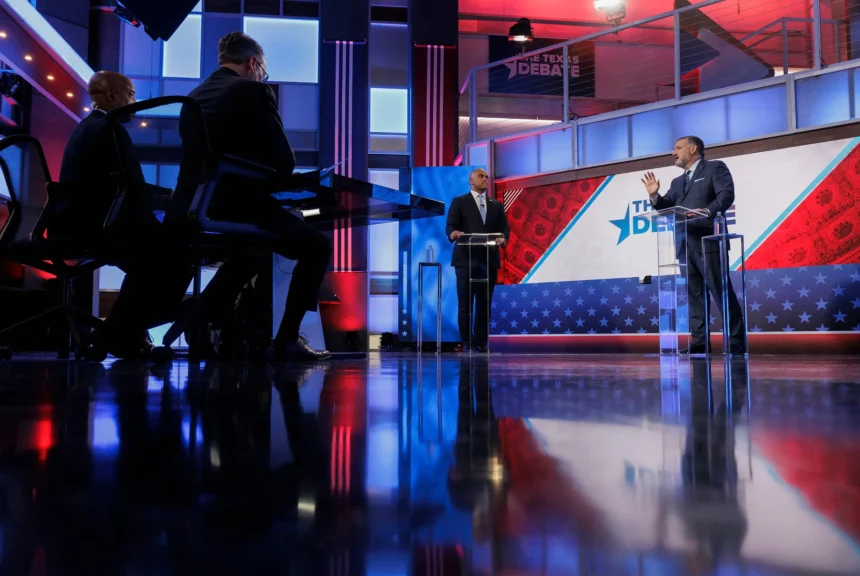 U. S. Rep. Colin allred, d-dallas, left, and u. S. Sen. Ted cruz, r-texas, take part in a debate for the u. S. Senate hosted by wfaa on oct. 15, 2024, in dallas.