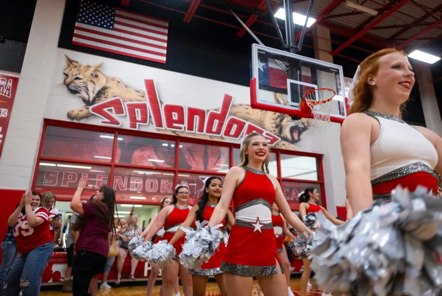 Cheer teams chant on beat during the "meet the wildcats" community event at splendora high school on aug. 16, 2024