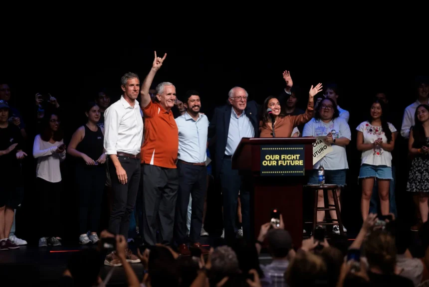 From left, beto o’rourke, lloyd doggett, greg casar, bernie sanders and alexandria ocasio-cortez speak at a rally organized by the university democrats organization at the university of texas at austin