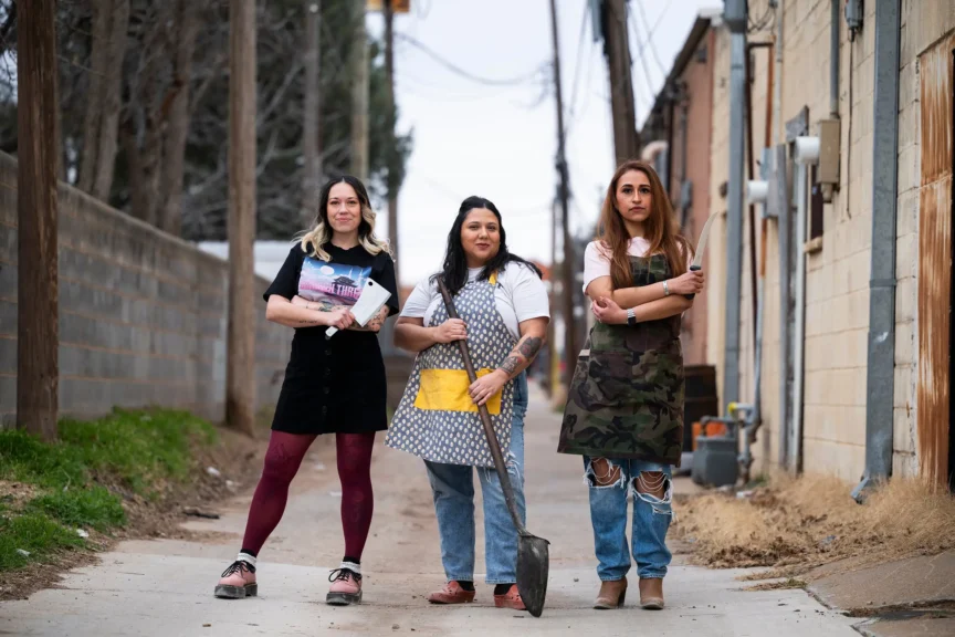 From left: simone see, jewel hill and raquel lopez in the alley behind hill barbecue in lubbock.