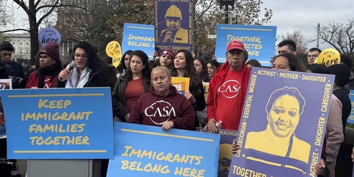 Rashida tlaib takes part in an immigration protest