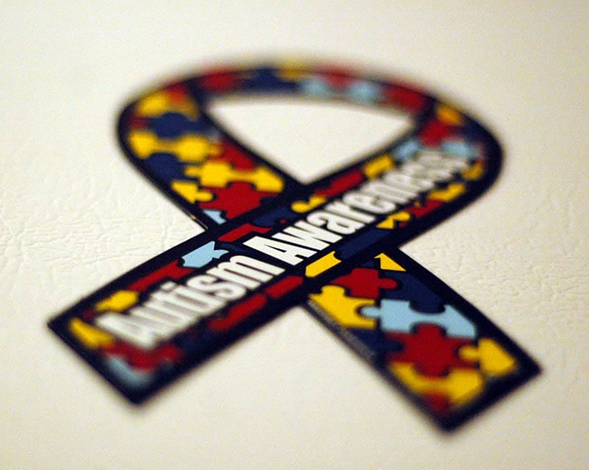 Crossing the us border. Autism awareness ribbon sticker