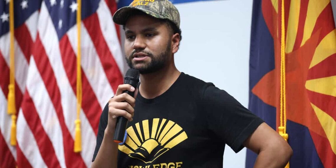 Maxwell frost at a campaign event for harris
