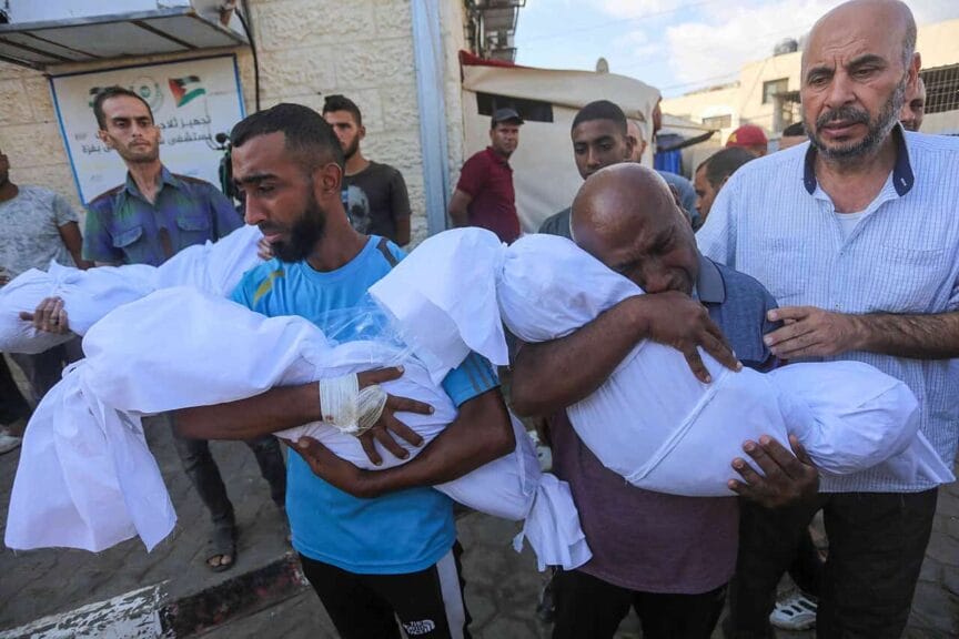 Man mourns family members killed in israel bombing