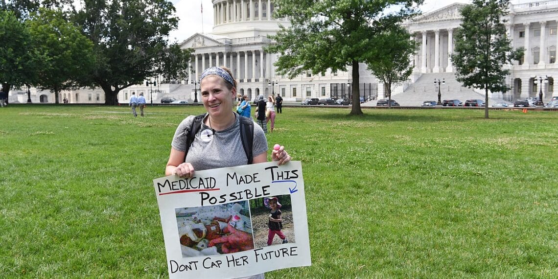 Medicaid protest sign