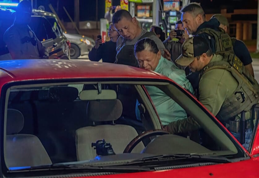 A man is handcuffed after one of the ice traffic stops in nashville.