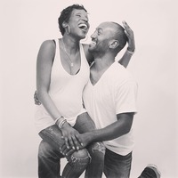 black and white photo of a couple laughing together